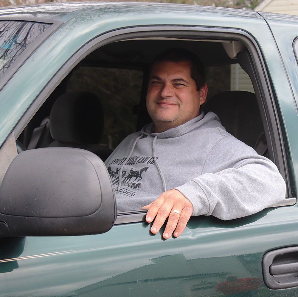 Patrick Ferrell sitting in a truck