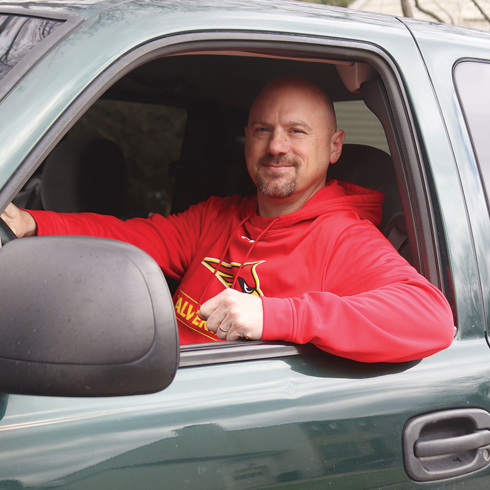 Phil Biedronski sitting in a truck