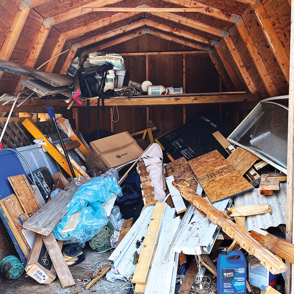Shed full of junk wood and siding
